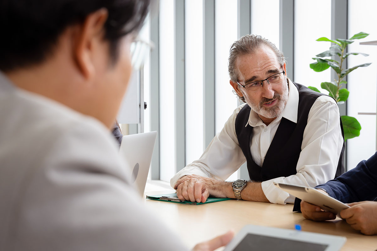 businessmen meeting with financial consultant