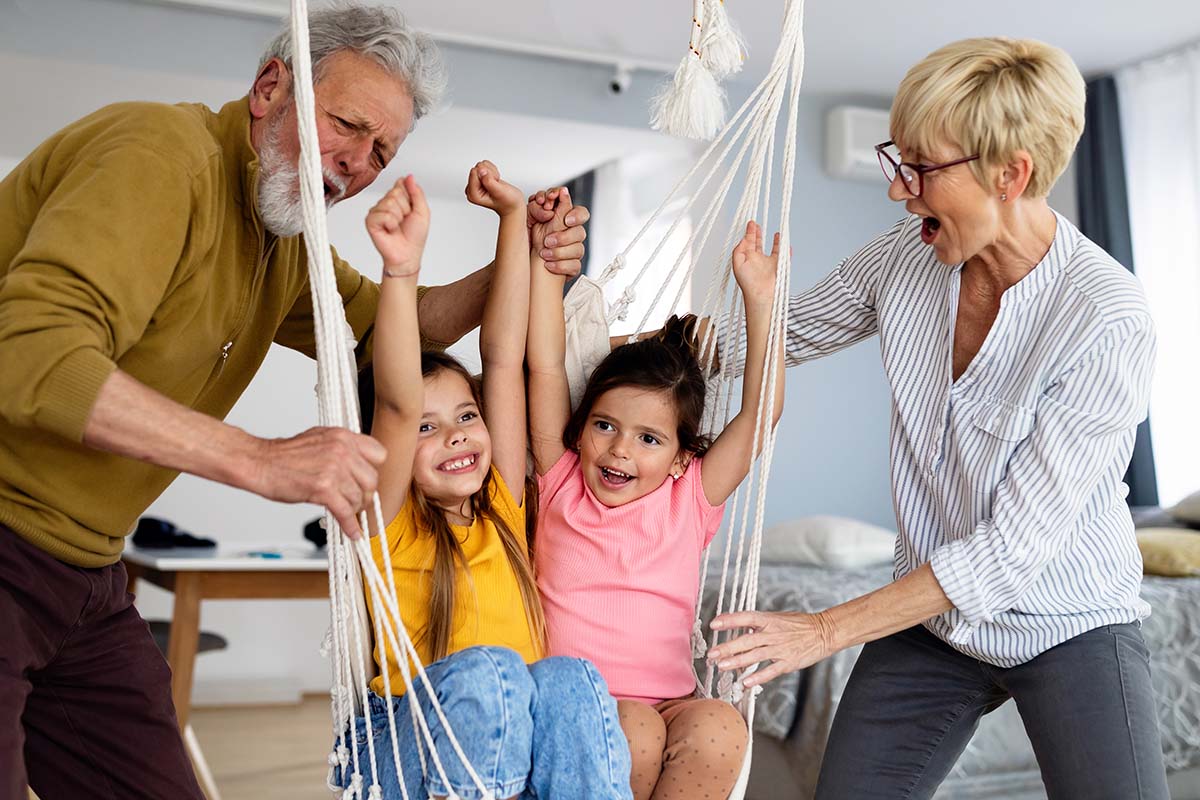 grandchildren having fun with their grandparents