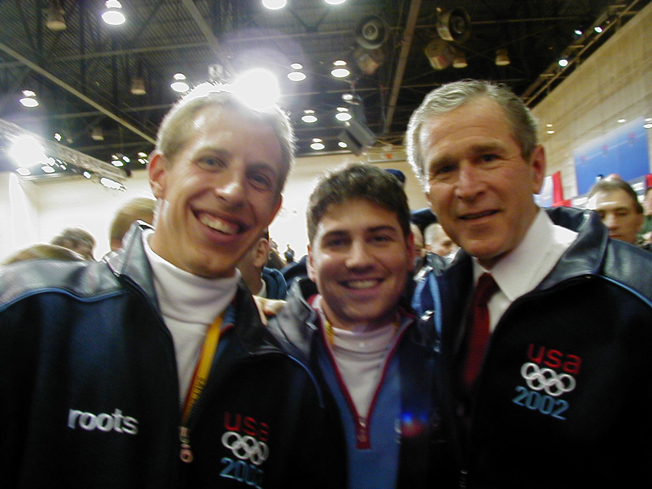 Jason Hedstrand poses for a photo with President George W. Bush at the 2002 Olympics
