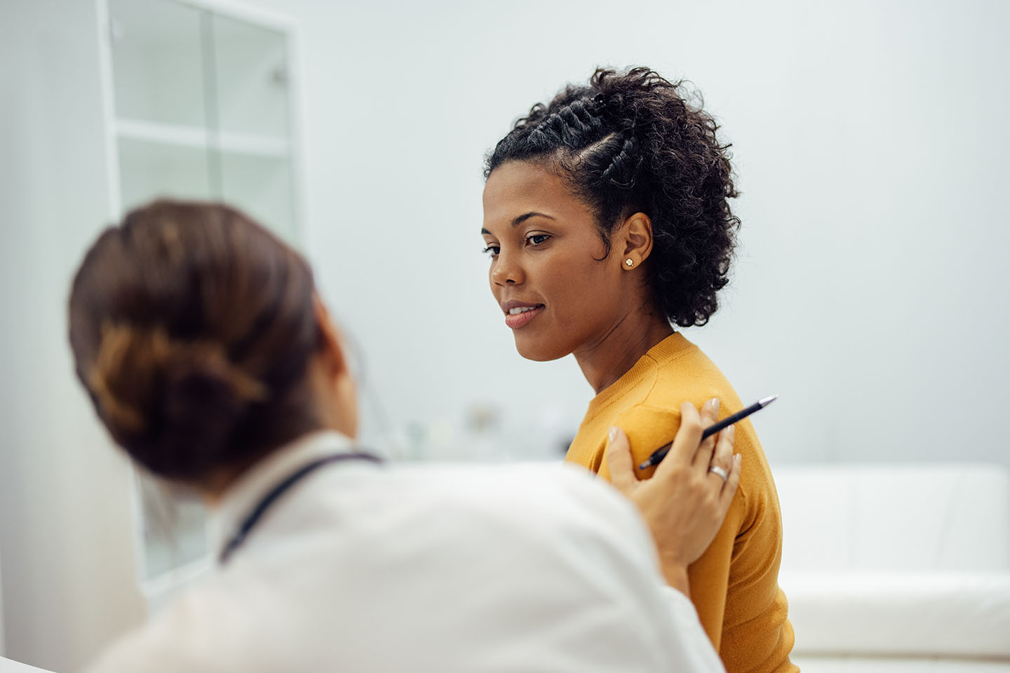 caring doctor reassures her patient