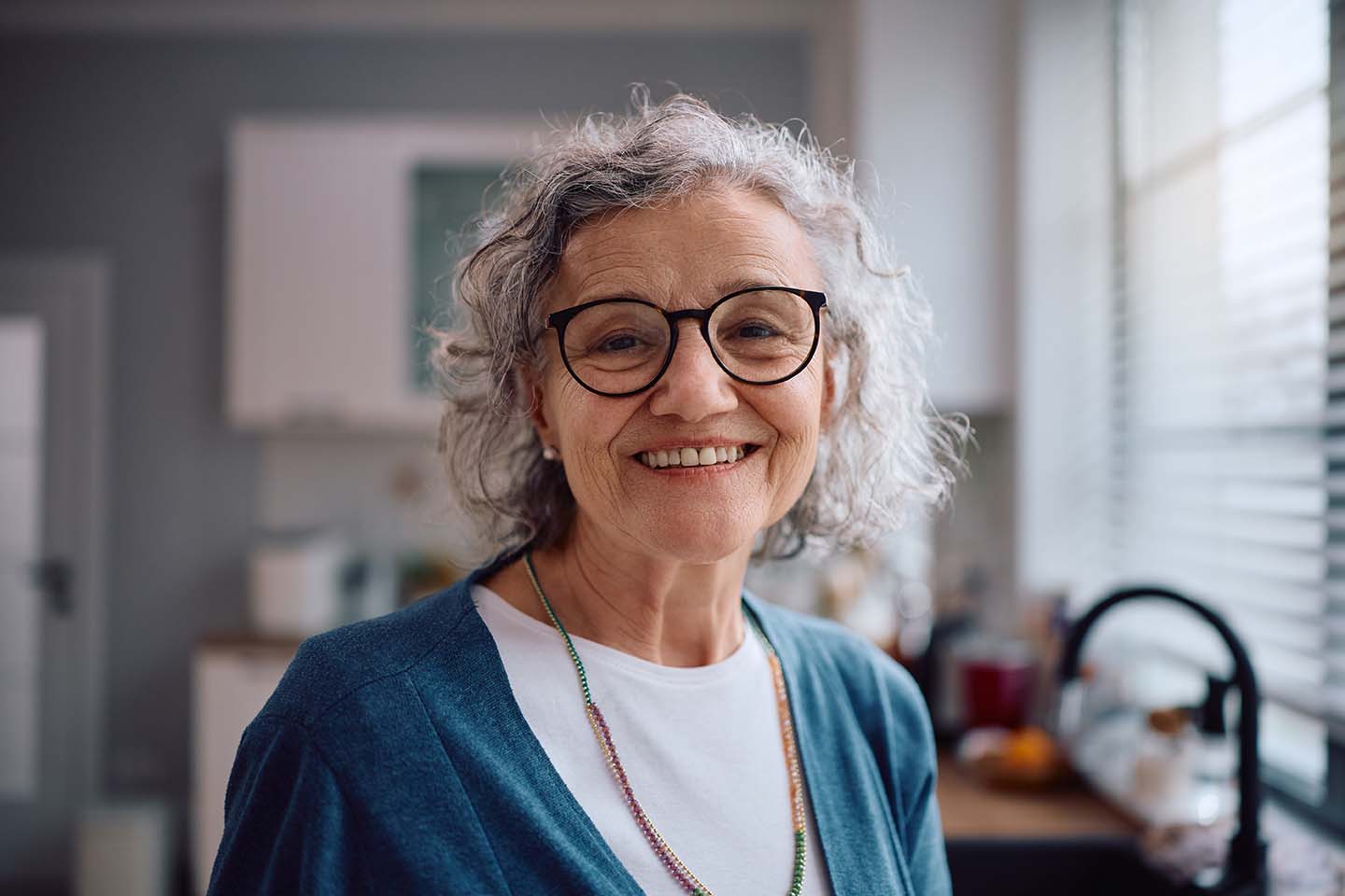 happy woman enjoying retirement at home