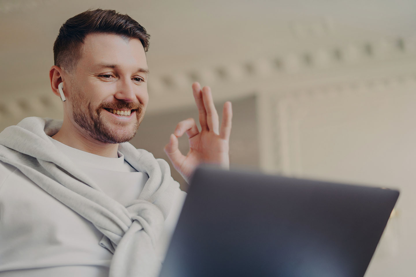 young man is happy with his health insurance options