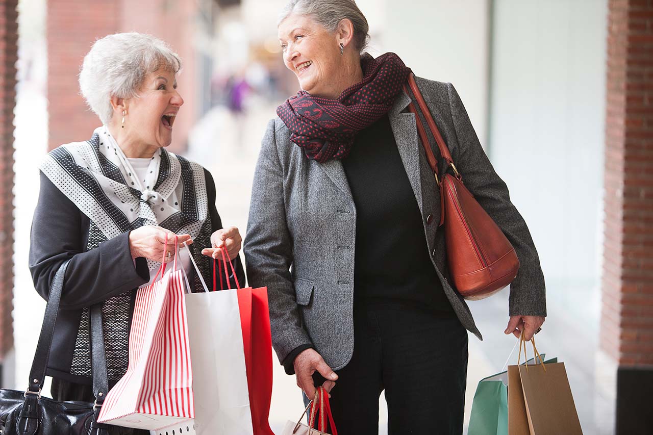Focal Point Financial Services can help answer your questions about Medicare women enjoying a shopping trip at the mall